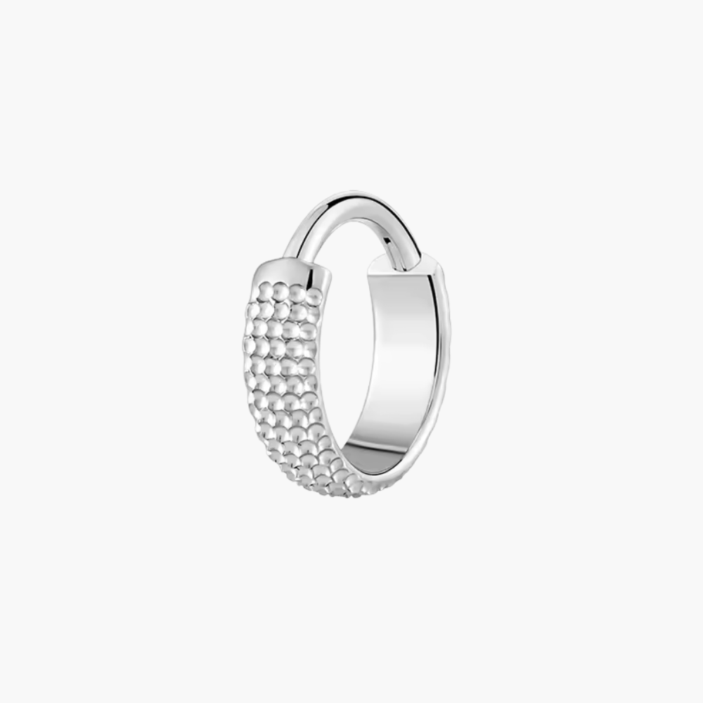 Wide Hammered Conch Clicker – Titanium Textured Industrial Septum Hoop
