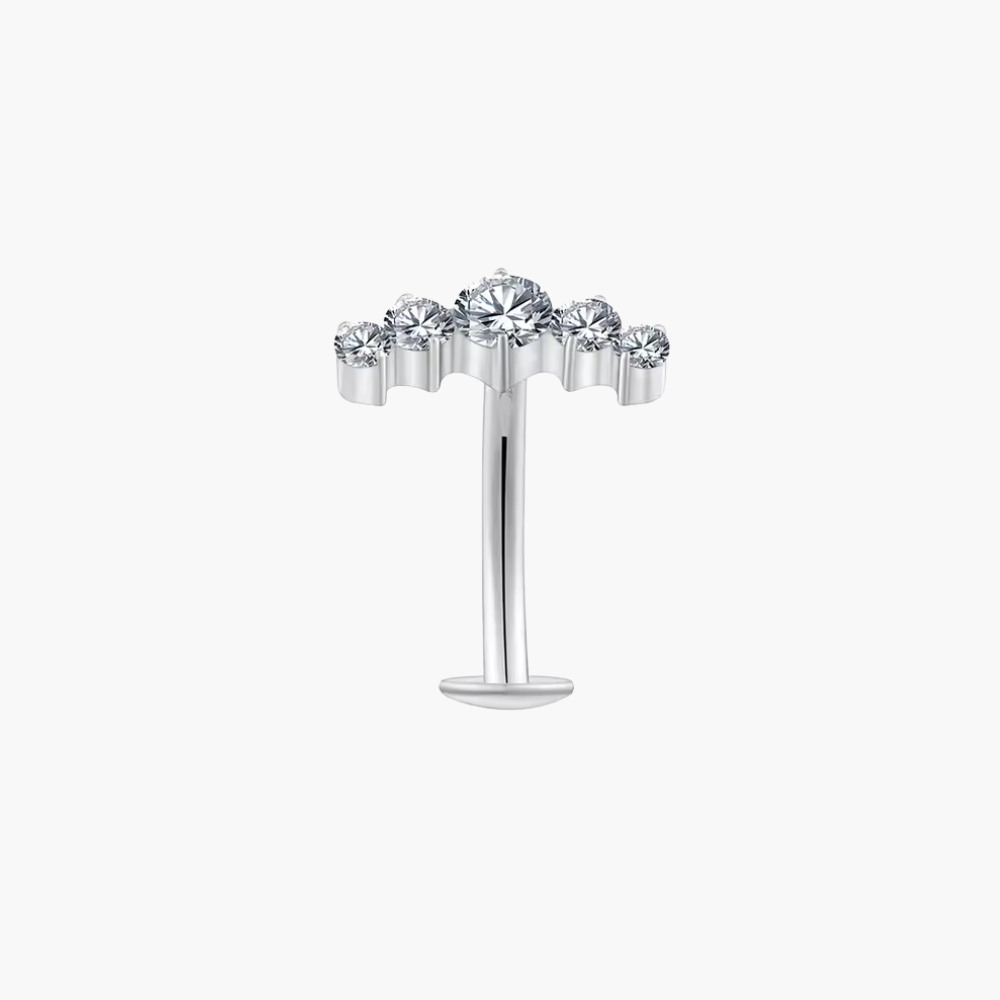 Implant-grade titanium (ASTM F136) threadless curved barbell with five floating CZ stones for navel piercings