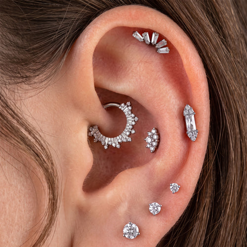 Close-up of the CZ (cubic zirconia) flat-back labret stud for helix, tragus and conch piercings, showing the finish detail