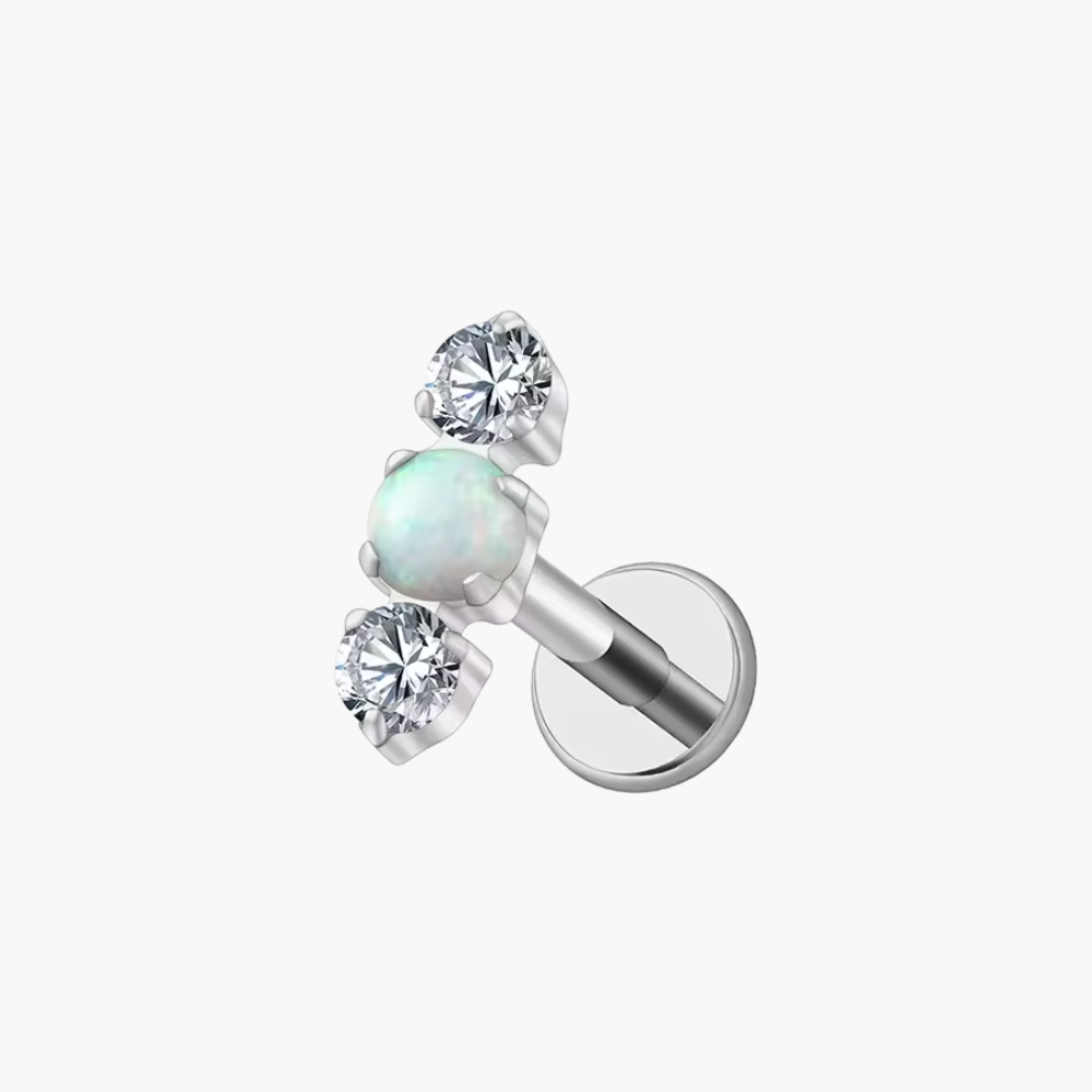 Implant-grade titanium (ASTM F136) flat-back stud with three white opals for helix and tragus piercings