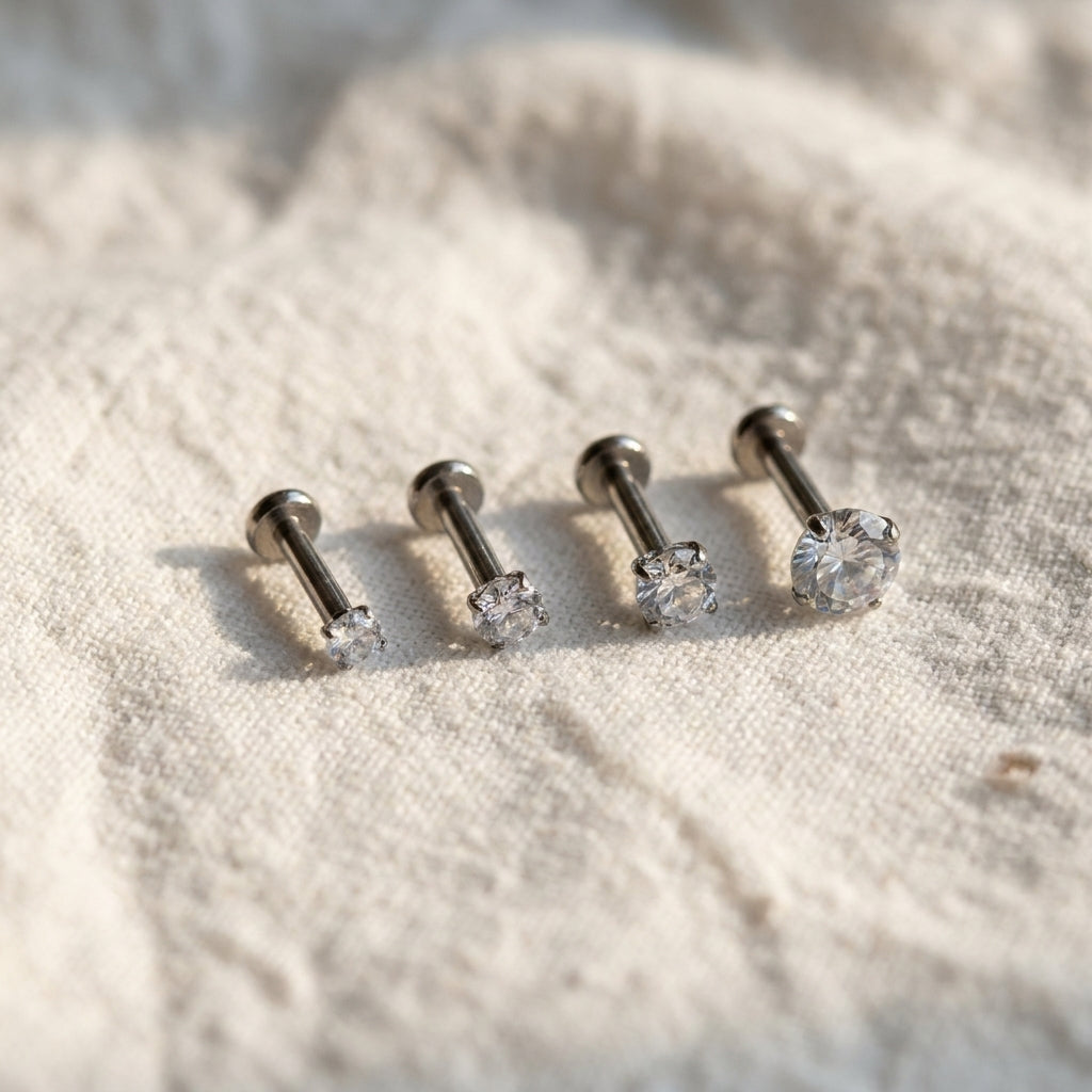 Detail view of the flat-back labret stud's flat back post, used for helix, tragus and nostril piercings
