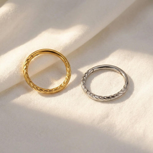 Close-up of the CZ (cubic zirconia) hinged clicker hoop for septum, nose and ear cartilage piercings, showing the finish detail