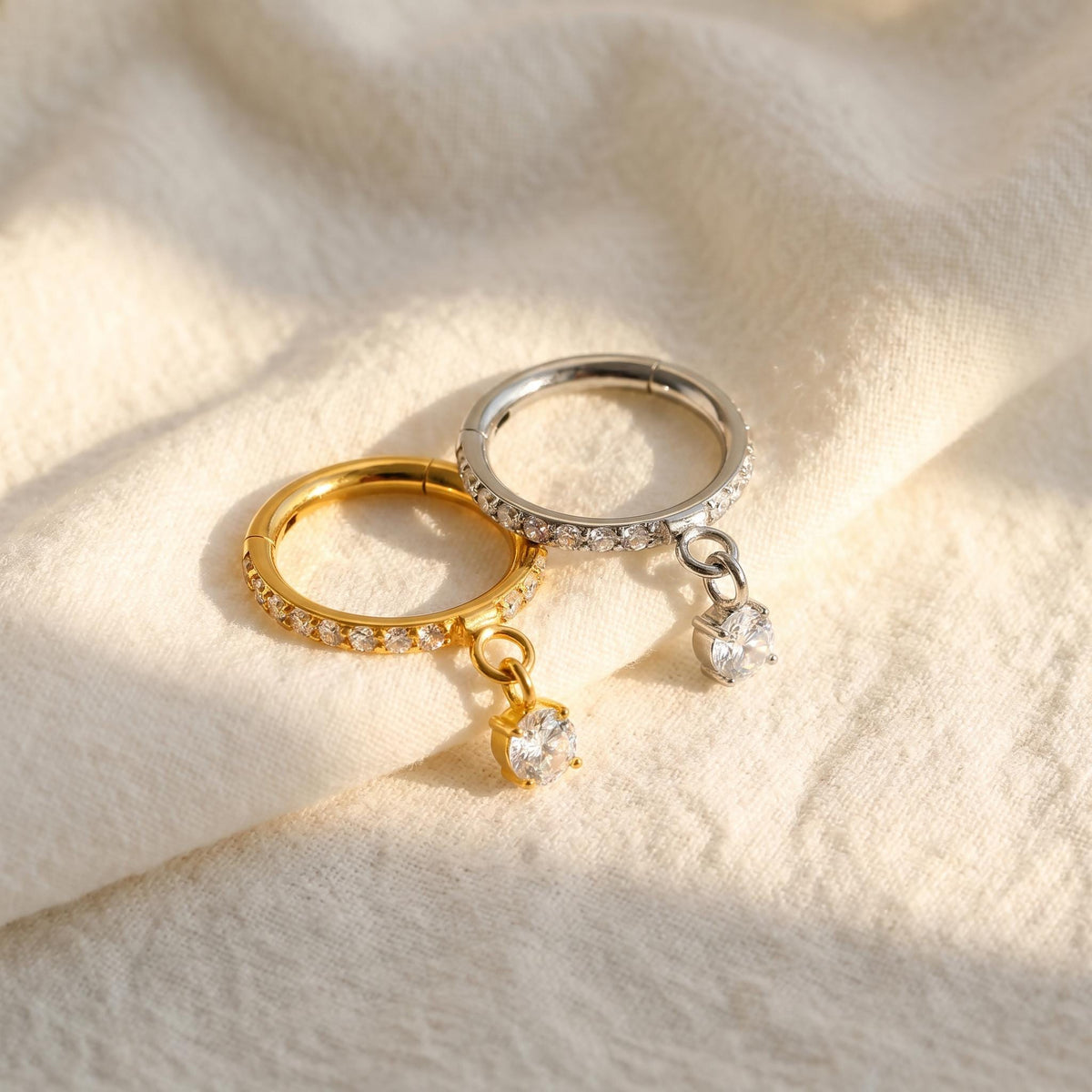 Dangle Charm Hoop 16G – Titanium Round CZ Helix Clicker
