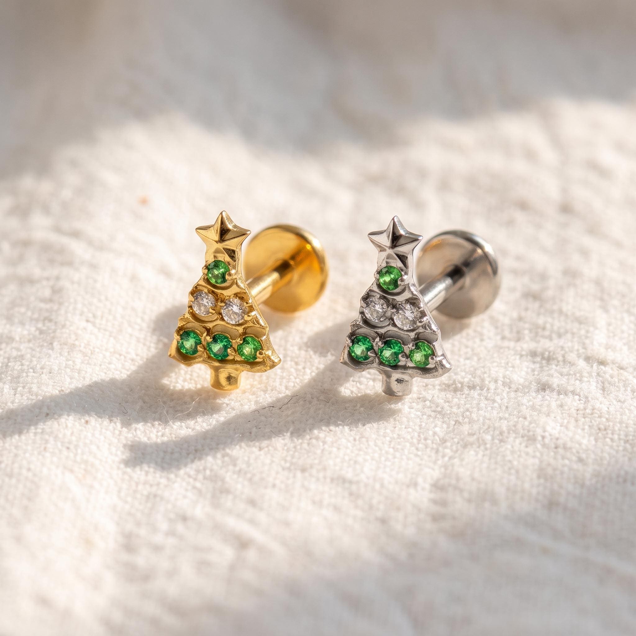 Close-up of the CZ (cubic zirconia) flat-back stud for helix and tragus piercings, showing the finish detail
