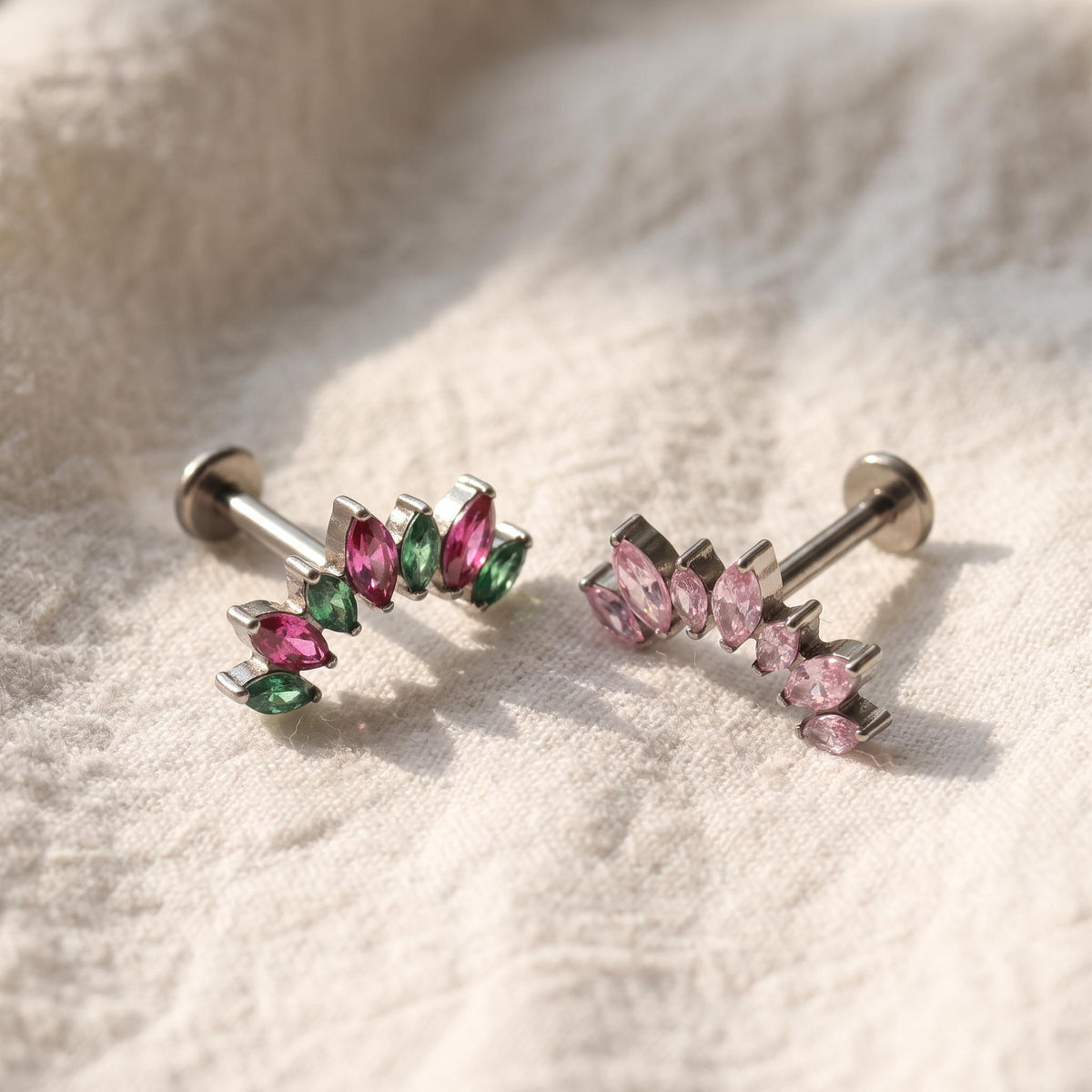 Angled view of the titanium curved marquise CZ ear climber stud for helix piercings