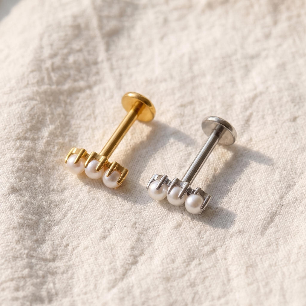 Detail view of the internally threaded stud's post, used for helix and conch piercings