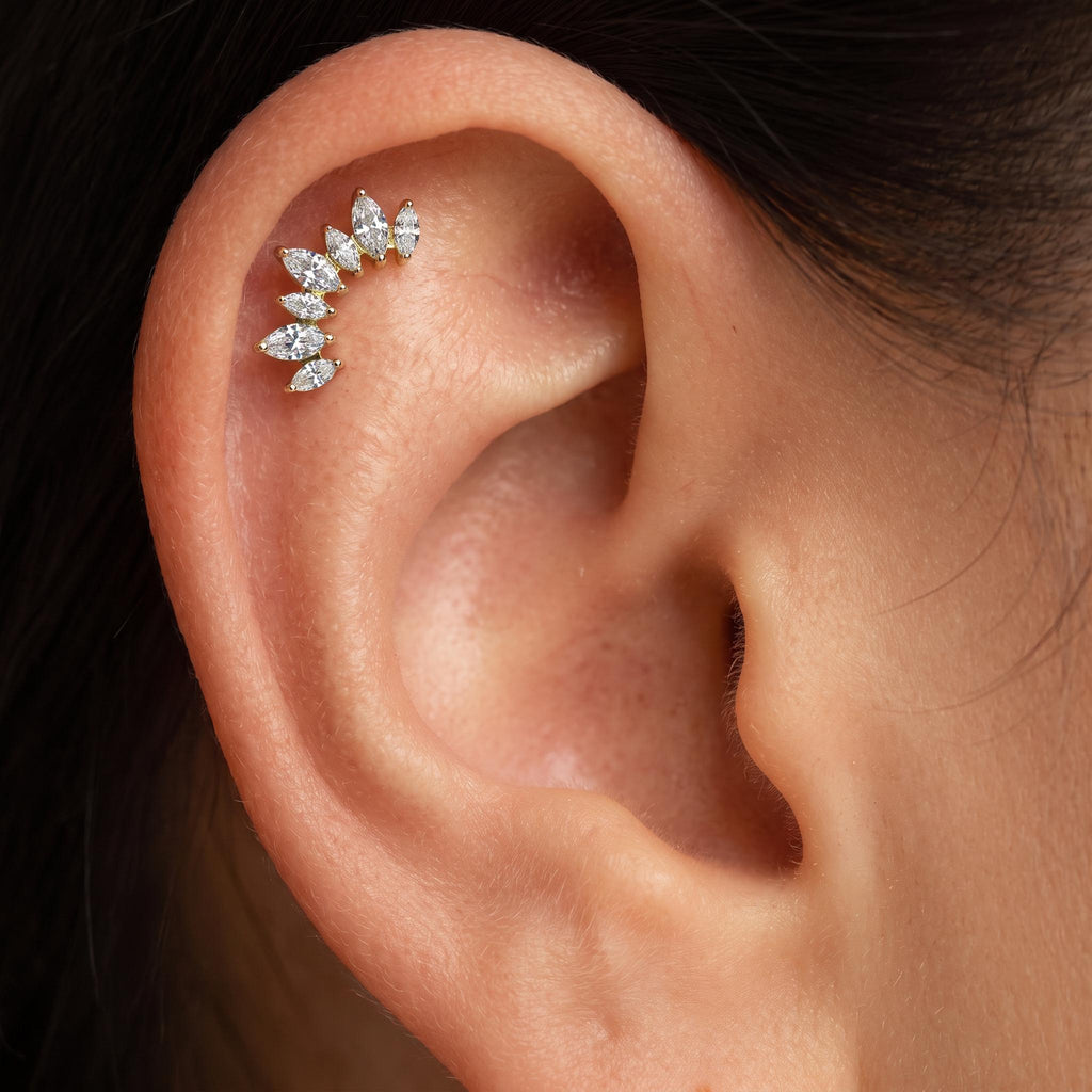 Close-up of the curved marquise CZ climber setting on the titanium stud, showing the finish detail