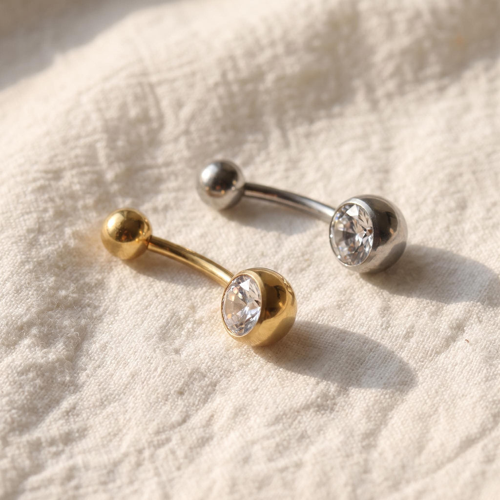 Front view of the titanium curved banana barbell designed for navel and belly button piercings