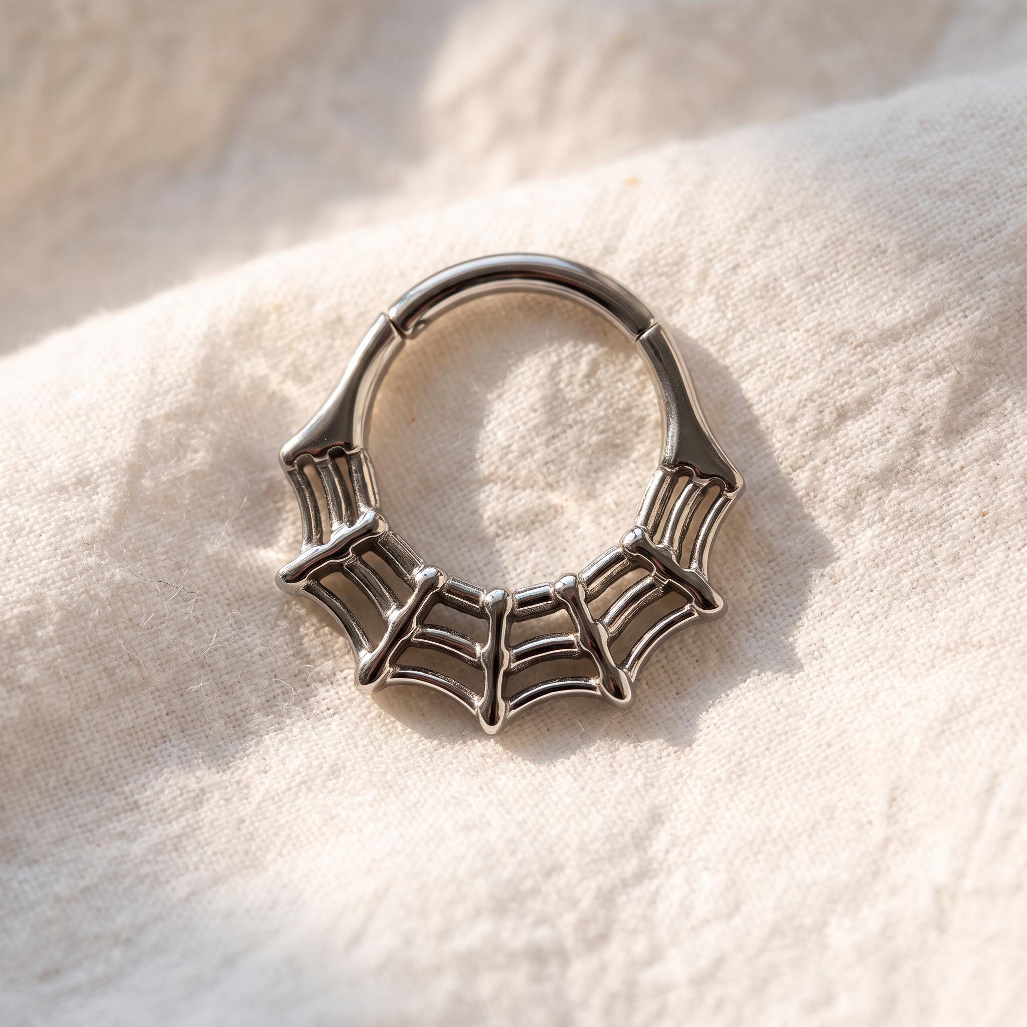 Spiderweb Septum Clicker – Titanium Gothic Daith Hoop